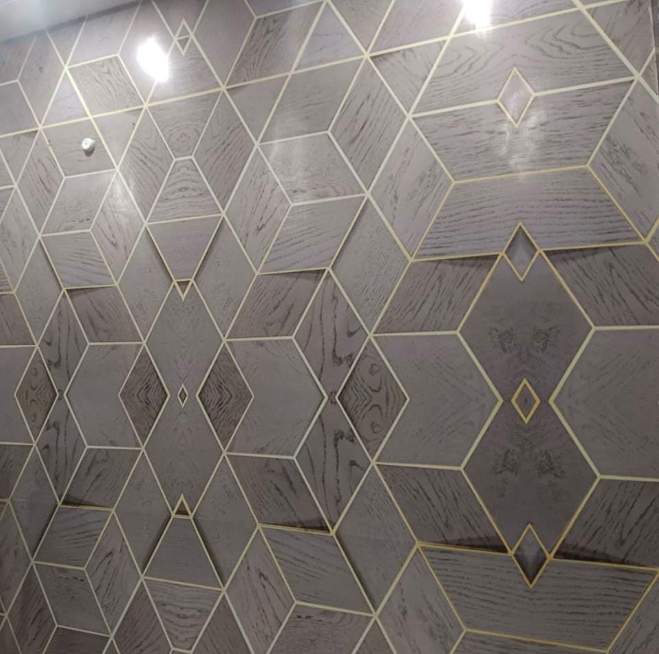 3D geometric wall panelling with golden inlay